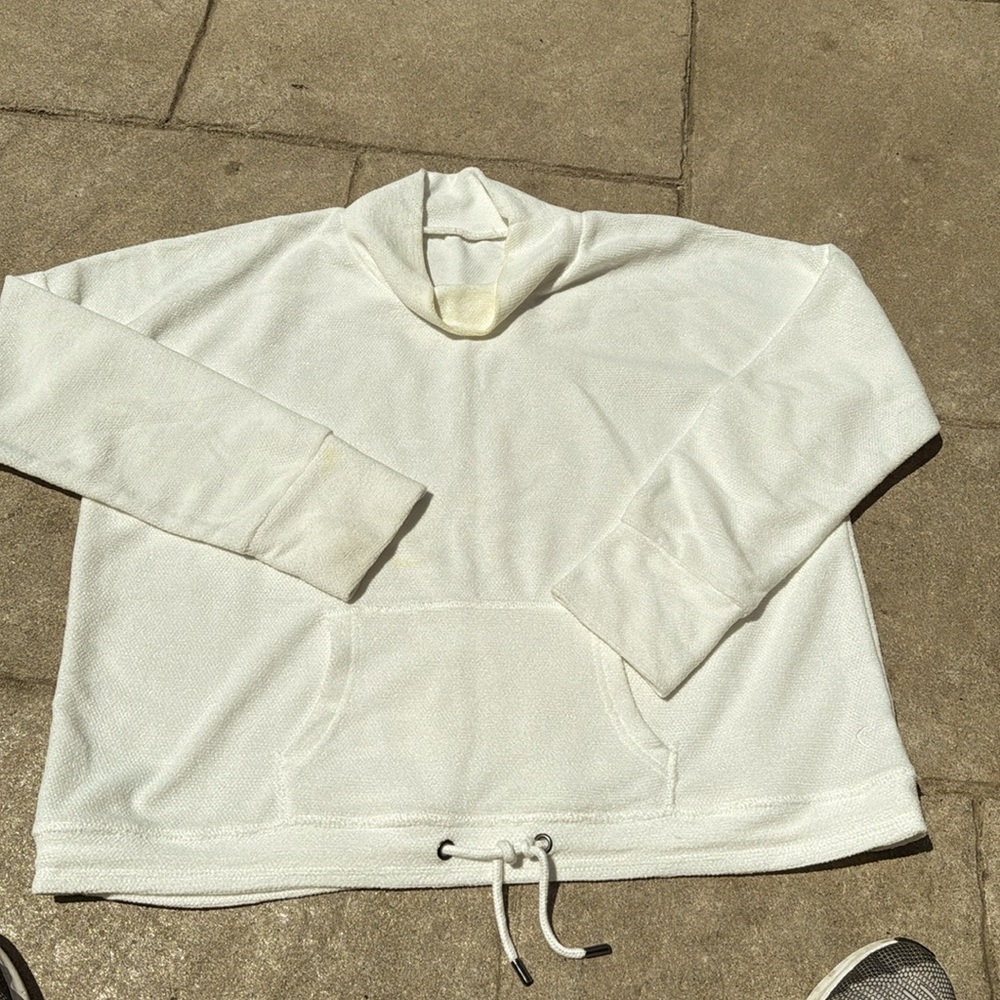 Pullover sweatshirt, has a small spot on the front